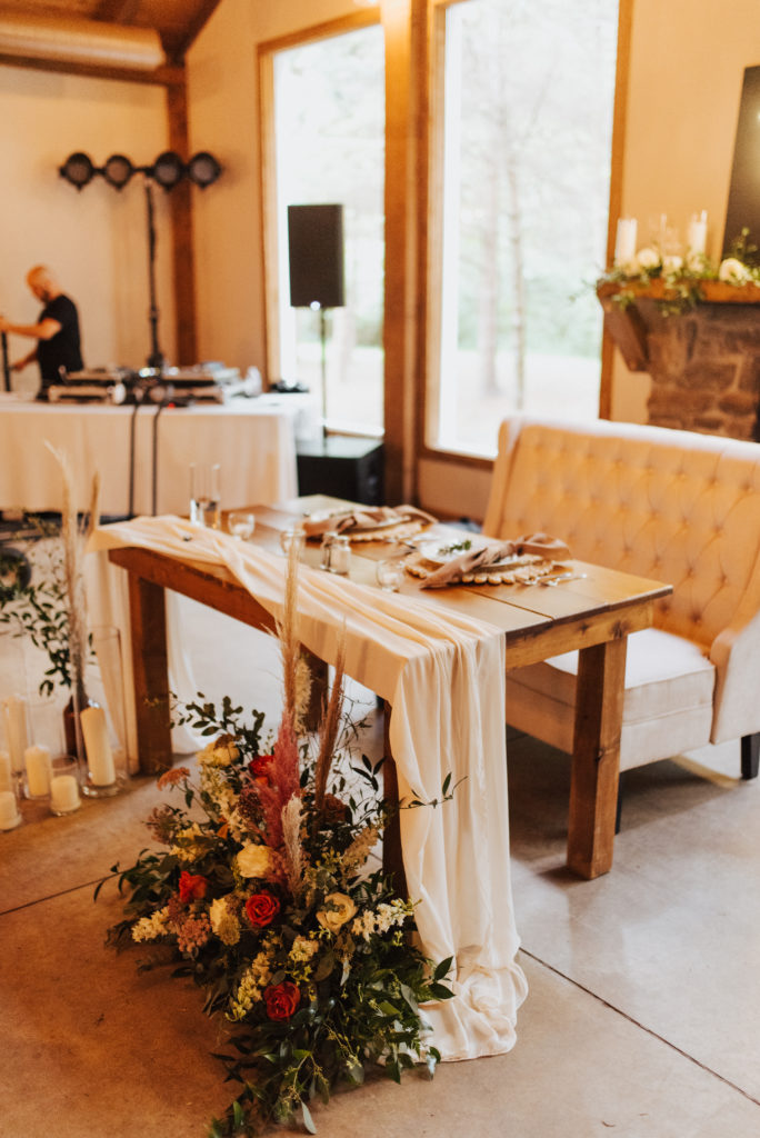 Sweetheart table at reception Pine Tree Barn